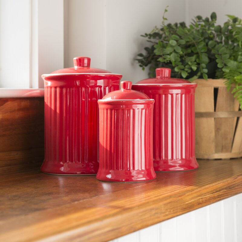 red canister set in glass        <h3 class=